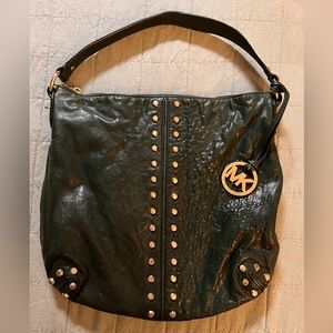 Green Michael Kors bag.
